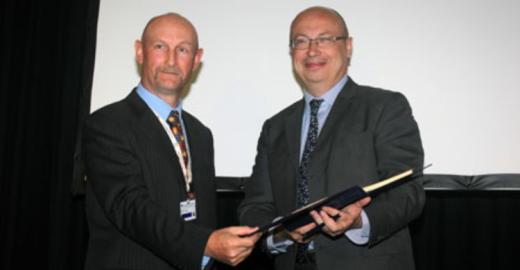 Ambassador Jean-Pierre Thébault (R) signing the Raptors MoU on behalf of the Government of France.